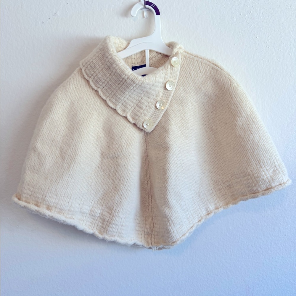 Young Girls Stylish Knitted Poncho.
